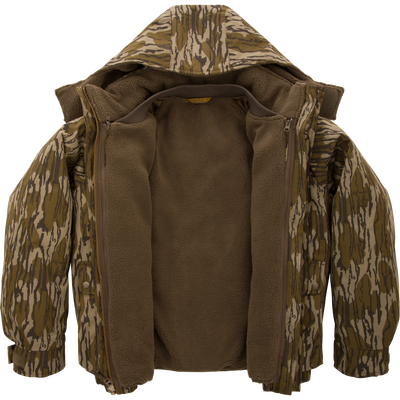 Throwback 80 Sport 3-in-1 Jacket with camouflage print, featuring a removable hood, large pockets, exposed fleece lining, ideal for versatile, weather-resistant outdoor adventures.