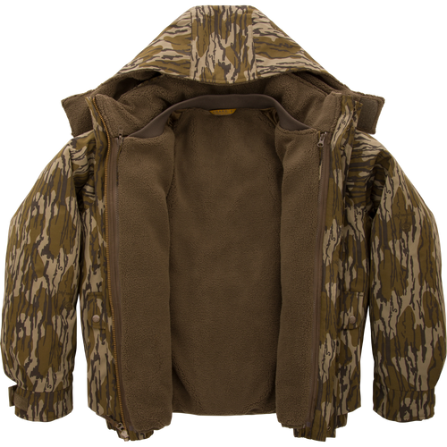 Throwback 80 Sport 3-in-1 Jacket with camouflage print, featuring a removable hood, large pockets, exposed fleece lining, ideal for versatile, weather-resistant outdoor adventures.