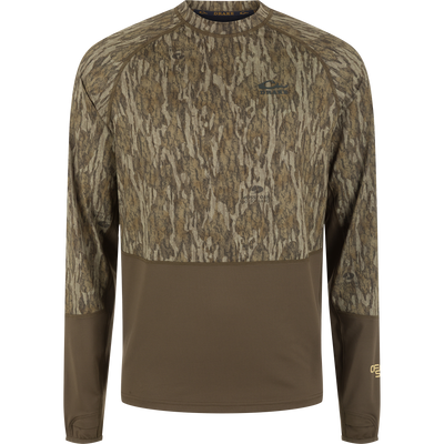 BMF EST Offset 1.0 Crew long-sleeve top features Mossy Oak camo, earthy brown sections, ergonomic thumbholes, built for breathability, moisture-wicking, and sun protection.