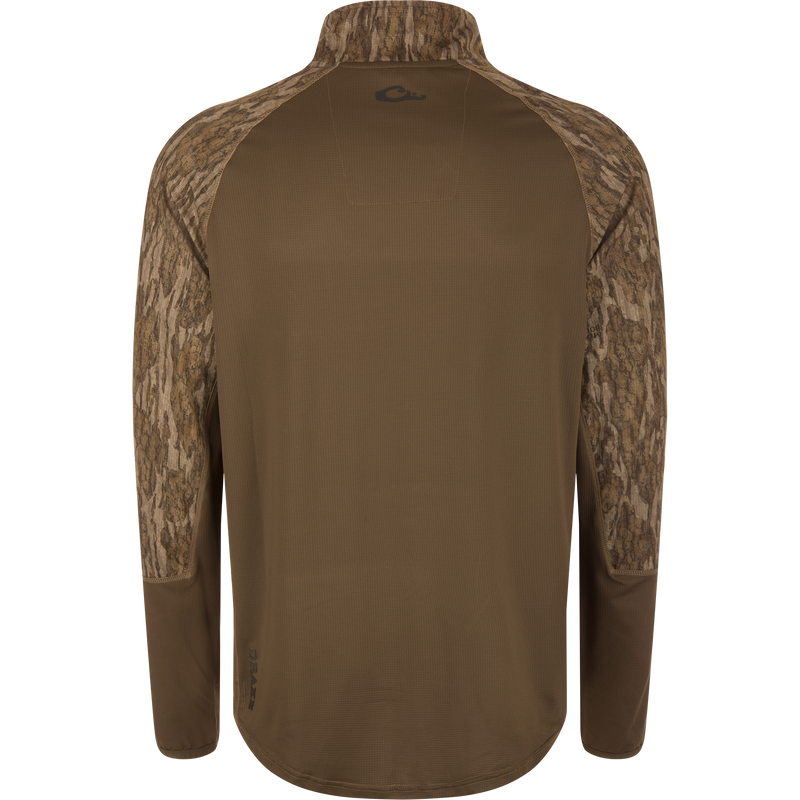 Back view of the EST Offset 1.0 Half Zip Pullover, featuring bark-style camouflage on shoulders, ergonomic thumbholes, and a small logo near the hem.