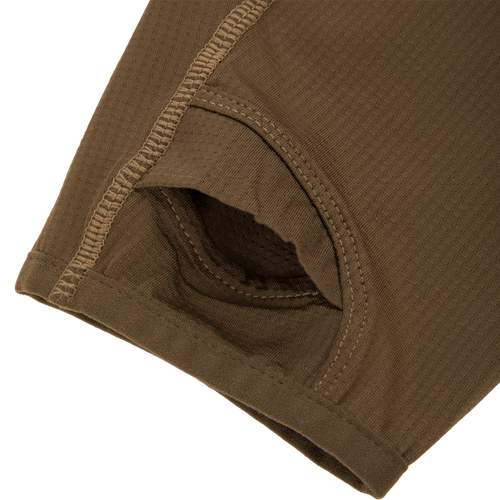 Close-up of the EST Offset 1.0 Half Zip Pullover, highlighting its waffle-knit texture and reinforced stitching, designed for comfort and performance in hunting and outdoor activities.