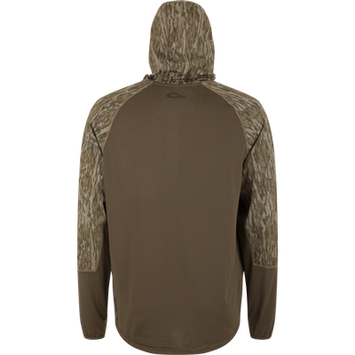 Back view of the BMF EST Offset 1.0 Quarter Zip Hoodie, featuring a brown waffle-textured body, camouflage raglan sleeves, and ergonomic thumbholes for enhanced comfort and fit.