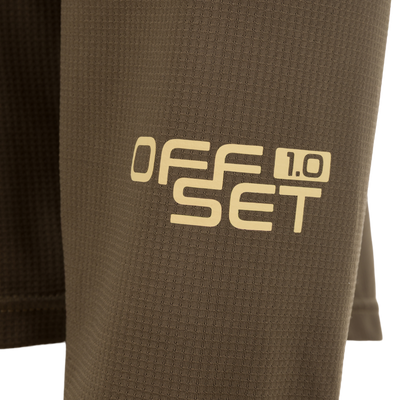 Close-up of BMF EST Offset 1.0 Quarter Zip Hoodie's waffle-knit fabric panels, showcasing durability and breathability, ideal for active pursuits in varying hunting environments.