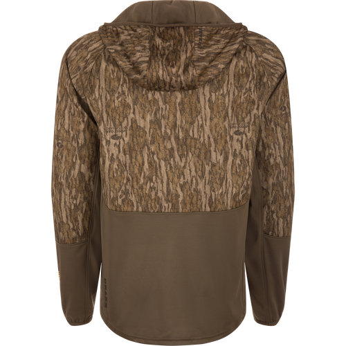 MST Offset 2.0 Half Zip Hoodie, featuring a Mossy Oak Bottomland camo upper and olive-brown lower, designed for comfort and functionality with multiple pockets.