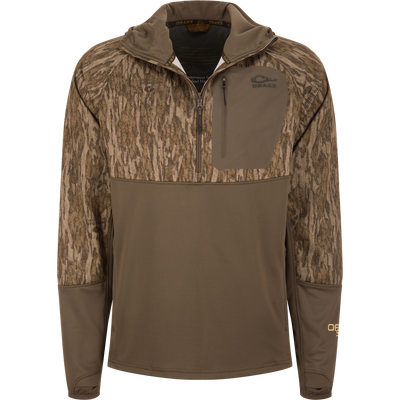 MST Offset 2.0 Half Zip Hoodie with tree-bark camouflage upper, solid brown lower, zippered chest pocket, and thumb-loop sleeves, designed for hunting comfort and functionality.
