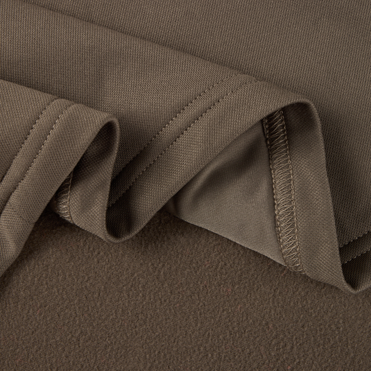 Close-up of MST Offset 2.0 Half Zip Hoodie fabric, showcasing its knit texture and soft brushed underside, exemplifying comfort and durability for outdoor adventures.