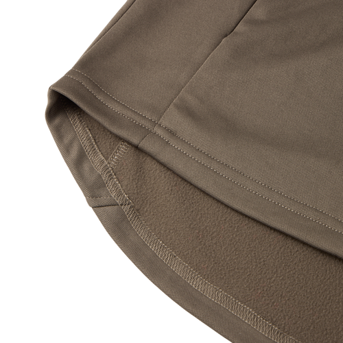 Close-up of the MST Offset 2.0 Half Zip Hoodie's hem, showcasing olive-brown outer fabric and soft fleece lining, highlighting its comfort and durability for outdoor adventures.