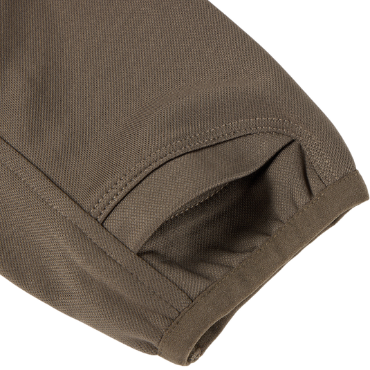 MST Offset 2.0 Half Zip Hoodie: Close-up of hem and curved pocket, showcasing durable, stretchy fabric ideal for outdoor adventures.