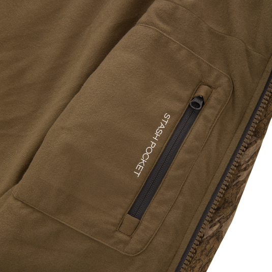 LST BMF Jacket with Primaloft, featuring an olive-brown fleece panel and zippered stash pocket, ideal for versatile, active use in variable conditions.