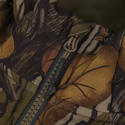 Close-up of a rubberized zipper pull on a Drake X Ducks Unlimited LST BMF Jacket with Primaloft in camouflage.