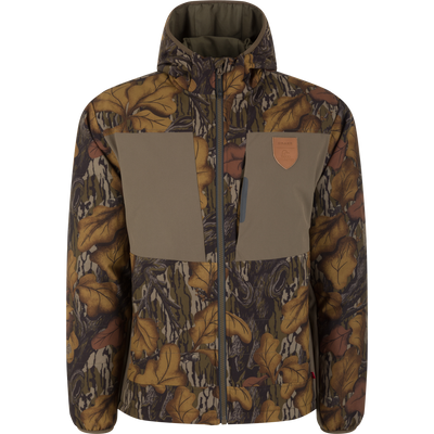 Drake X Ducks Unlimited LST BMF Jacket with Primaloft featuring a Mossy Oak Fall Foliage camouflage pattern, a solid olive chest panel with a leather-style logo patch, and insulation.