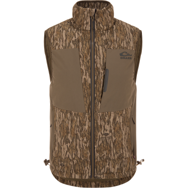 LST BMF Vest with Primaloft in Mossy Oak Bottomland camo, featuring a zip front, two chest pockets, and an adjustable hem for versatile hunting layering.