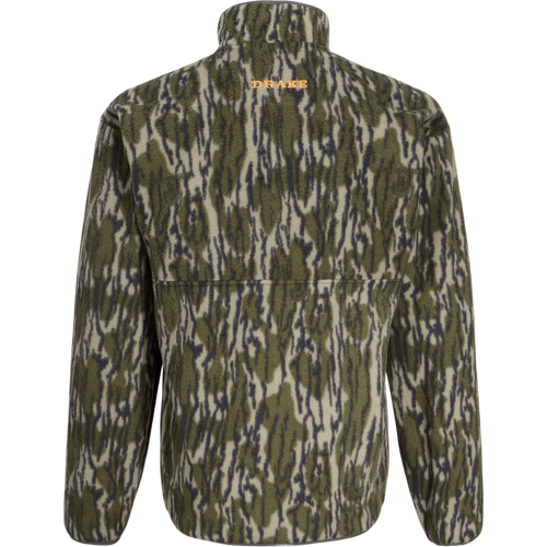 Back view of the Camp Fleece Limited Edition Snap Pullover in woodland camouflage with orange DRAKE embroidery below collar, featuring open side pockets.