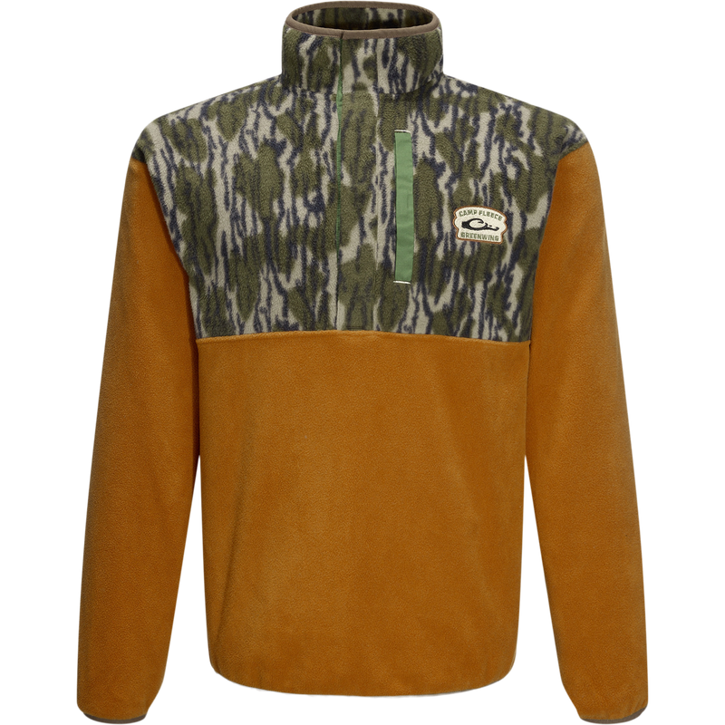 Camp Fleece Limited Edition Snap Pullover with camo-patterned chest, warm brown body, and Camp Fleece Greenwing patch, featuring open pockets and a half-zip placket.