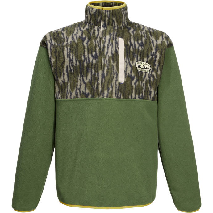 Camp Fleece Limited Edition Snap Pullover with camo-patterned chest, solid sleeves, quarter-zip, and pockets for warmth, ideal for layering in outdoor activities.