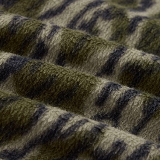Close-up of the Camp Fleece Limited Edition Snap Pullover, showcasing its olive-green camouflage pattern and soft, pile-textured fleece fabric with updated features.