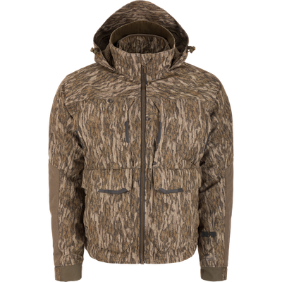 LST CommandXT 3-in-1 PrimaLoft Insulated Jacket, featuring a camo pattern, adjustable hood, articulated sleeves, multiple pockets, and a durable, weatherproof design ideal for hunting.
