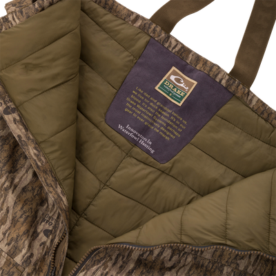 LST CommandXT Bib with Primaloft, showcasing olive-green lining, Drake Waterfowl label, and features like reinforced panels, PrimaLoft insulation, and Magnattach cargo pockets.