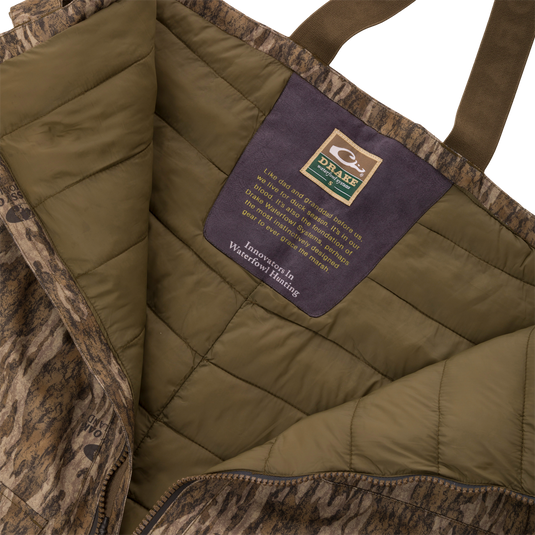 LST CommandXT Bib with Primaloft, showcasing olive-green lining, Drake Waterfowl label, and features like reinforced panels, PrimaLoft insulation, and Magnattach cargo pockets.