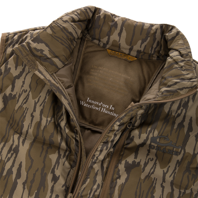 BMF Drake Down Vest with camo pattern, featuring a two-way front zipper and branded inner panel. Offers premium warmth and mobility for hunting.