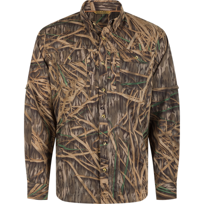 Waterfowl EST Wingshooter Trey Long Sleeve Shirt in a brown and green marsh grass camouflage pattern, featuring a moisture-wicking button-up design, two chest pockets, and UPF 30 sun protection.