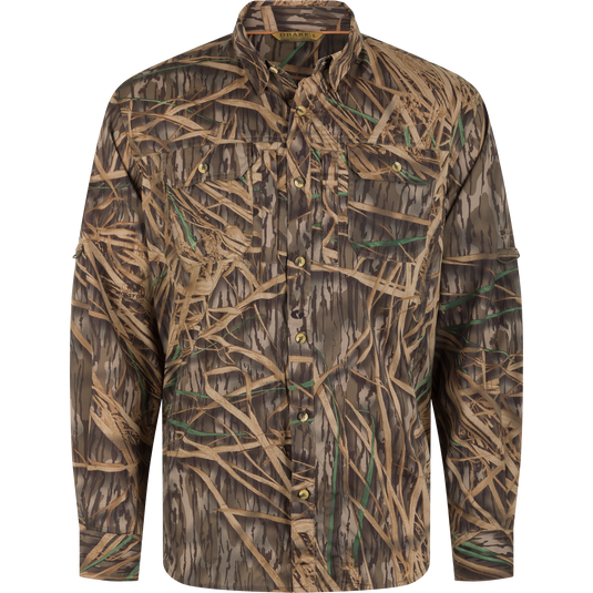 Waterfowl EST Wingshooter Trey Long Sleeve Shirt in a brown and green marsh grass camouflage pattern, featuring a moisture-wicking button-up design, two chest pockets, and UPF 30 sun protection.