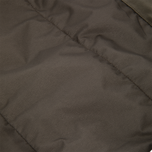 Close-up of the LST BMF Eqwader Full Zip with Primaloft, showcasing quilted, padded nylon-like fabric and detailed stitching for optimal outdoor weather protection.