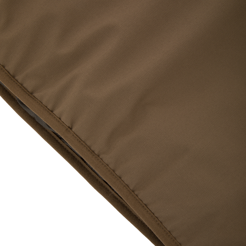 Close-up of LST BMF Eqwader Full Zip with Primaloft, showcasing diagonal stitched seam and padded, quilted synthetic fabric for weather protection and warmth.