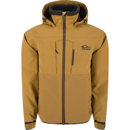 LST BMF Eqwader Full Zip with Primaloft: Insulated jacket featuring zippered chest pockets, adjustable cuffs, and fleece-lined hood, ideal for cold-weather outdoor activities.