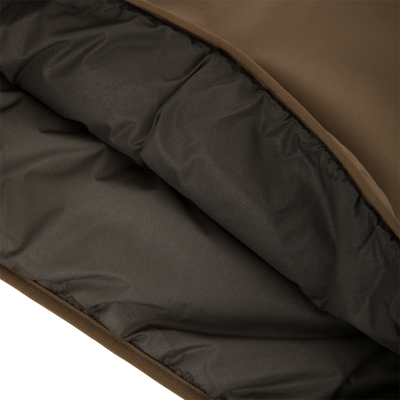 Close-up of the LST BMF Eqwader Half Zip Jacket showing its brown shell and quilted insulated lining for warmth and protection in harsh weather.