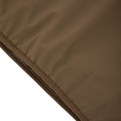 Close-up of the LST BMF Eqwader Half Zip Jacket with Primaloft, showcasing quilted, insulated fabric with a diagonal seam, ideal for warmth and weather resistance.