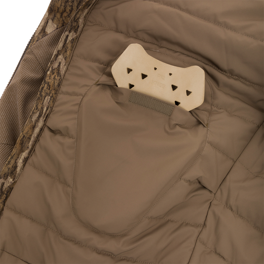 LST BMF Pit Bib with Primaloft, featuring internal removable D3O® P12 knee pad in pocket, showcasing rugged design for demanding hunting conditions.