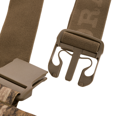 Close-up of durable quick-release buckle on nylon webbing, part of the LST BMF Pit Bib designed for rugged performance in hunting and outdoor activities.