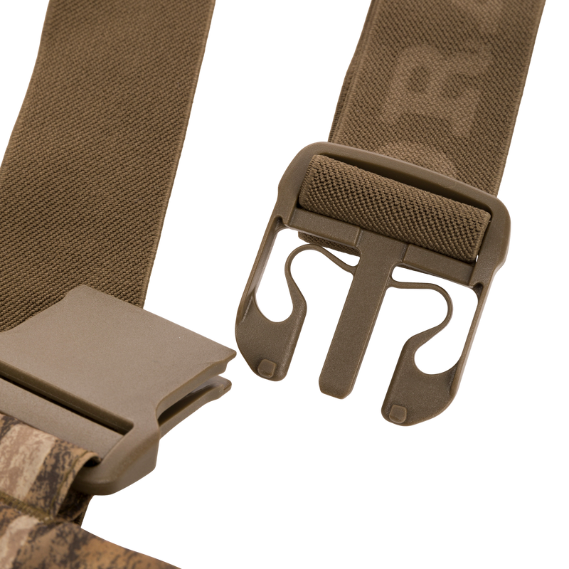 Close-up of durable quick-release buckle on nylon webbing, part of the LST BMF Pit Bib designed for rugged performance in hunting and outdoor activities.