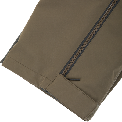 Olive drab Drake X Ducks Unlimited LST BMF Pit Bib with Primaloft pant leg featuring a side zipper and a hook-and-loop tab at the ankle.