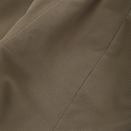 Close-up of olive green, micro-grid textured fabric with a vertical seam on a Drake X Ducks Unlimited LST BMF Pit Bib with Primaloft.