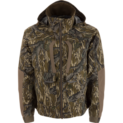 LST BMF Pit Jacket on mannequin, featuring camouflage pattern, adjustable hood, reinforced elbows, and chest pockets, designed for extreme outdoor conditions with durable, weather-resistant materials.
