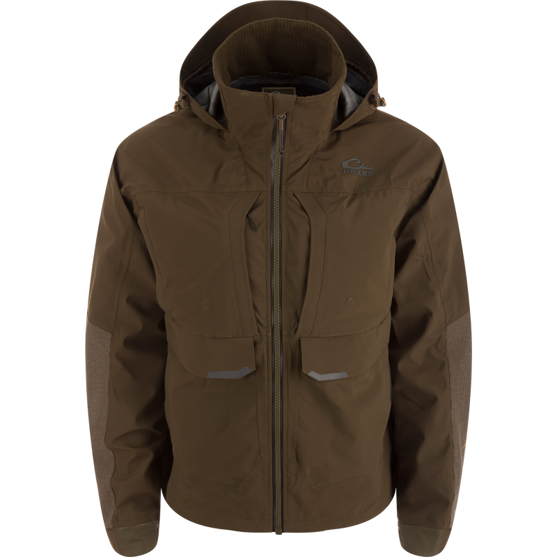 LST BMF Pit Jacket with high collar, hood, reinforced elbows, and multiple zippered pockets designed for extreme weather protection and durability.