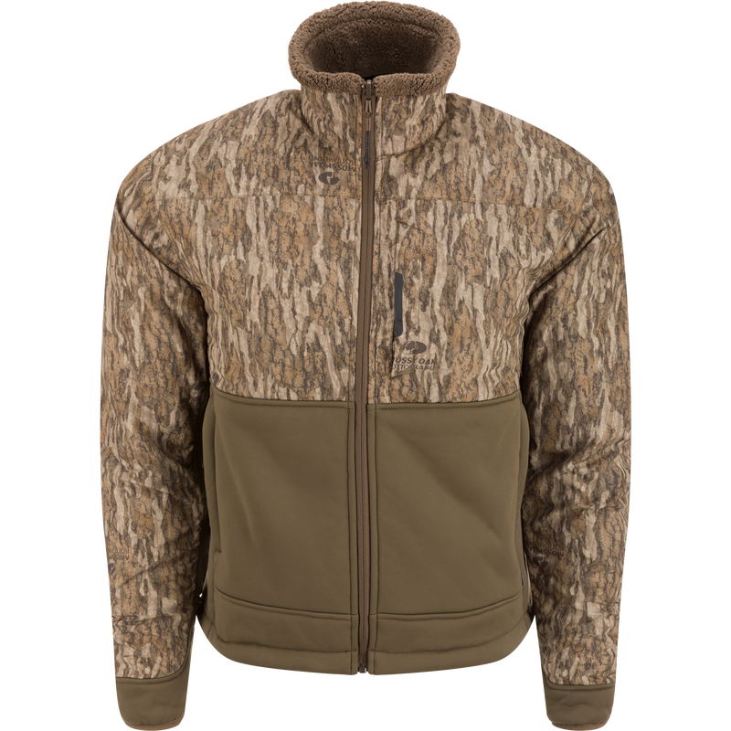 LST BMF 3-in-1 Pit Jacket with Primaloft, featuring a camouflage upper, olive-drab lower, fleece-lined collar, and multiple zip pockets, designed for versatility and durability.