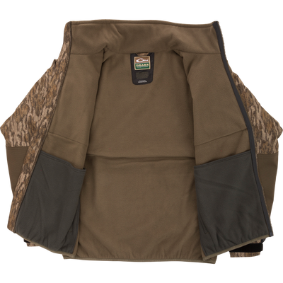 MST CommandXT Eqwader Full Zip Jacket, fleece-lined with camo panels, unzipped to show interior pockets and Drake label, ideal for rugged hunting conditions.