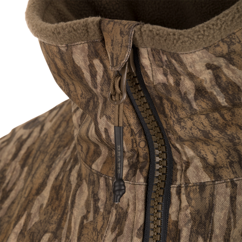 Close-up of the MST CommandXT Eqwader Full Zip Jacket, showcasing the fleece-lined hood, chunky zipper, and draw-cord toggle, highlighting its rugged design for demanding conditions.