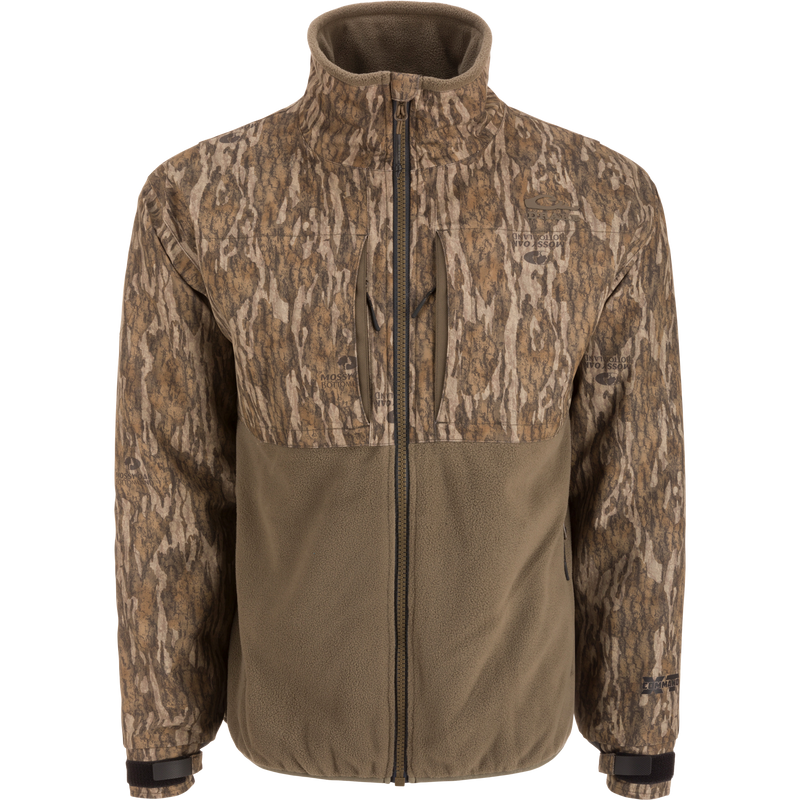 MST CommandXT Eqwader Full Zip Jacket with camouflage upper and olive-brown fleece lower, features zippered chest pockets and adjustable cuffs for outdoor enthusiasts.
