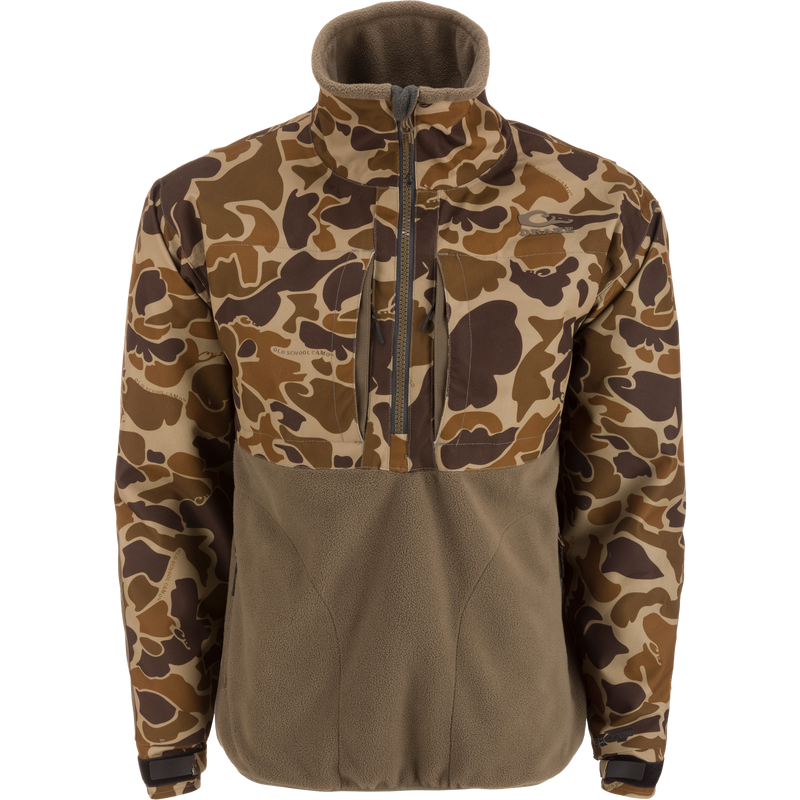 MST CommandXT Eqwader Half Zip Jacket with camo top and brown fleece lower body, featuring waterproof polyester and reinforced abrasion zones, ideal for outdoor and hunting activities.