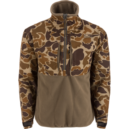MST CommandXT Eqwader Half Zip Jacket with camo top and brown fleece lower body, featuring waterproof polyester and reinforced abrasion zones, ideal for outdoor and hunting activities.