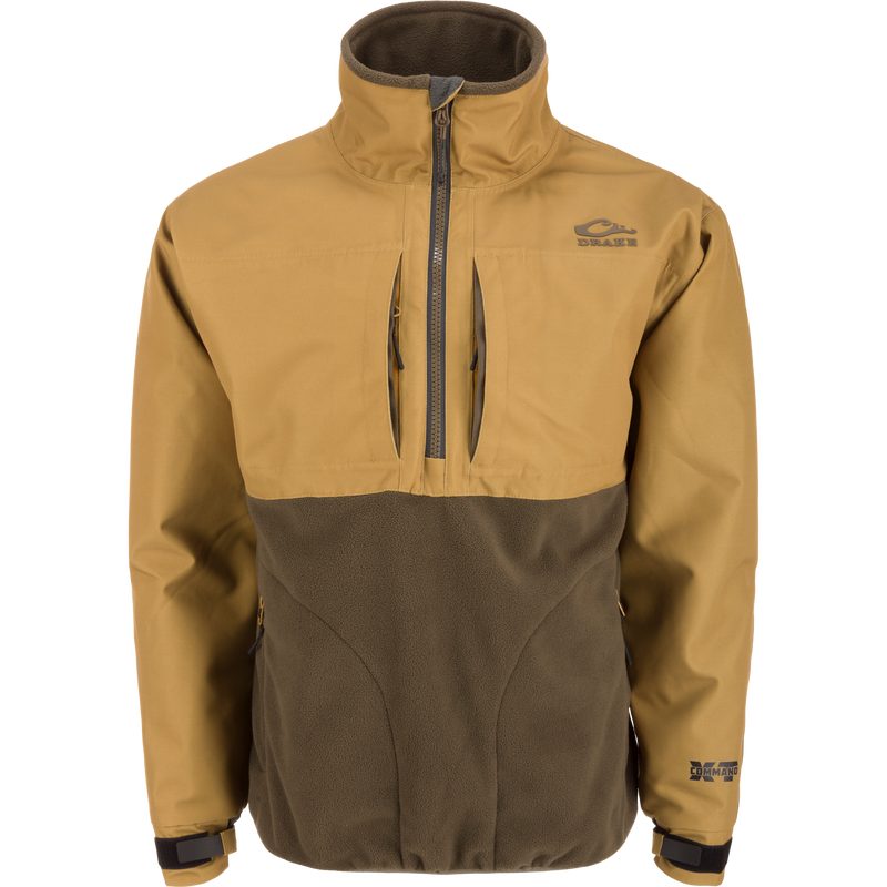 MST CommandXT Eqwader Half Zip Jacket with tan-brown shell, olive-green fleece, high collar, zip pockets, and Drake logo; designed for weather protection and warmth.
