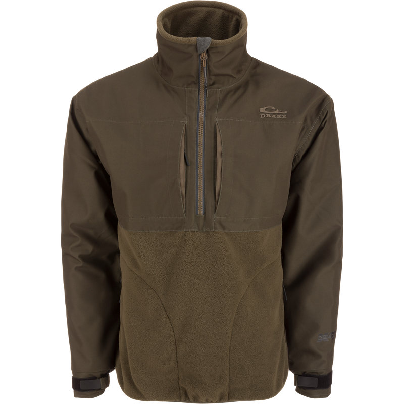 MST CommandXT Eqwader Half Zip Jacket with high collar, zippered chest pocket, adjustable cuffs, and fleece lower body, designed for weather protection and durability.