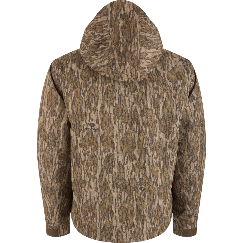 Back view of LST Hardline 3-in-1 Jacket in tree-bark camouflage, featuring a hood, elasticized cuffs, and ergonomic design for adaptable hunting protection.