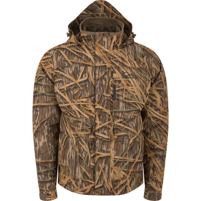 LST Hardline 3-in-1 Jacket in marsh camouflage, features multiple pockets, adjustable cuffs, and a zip closure, designed for versatile waterfowl hunting protection.