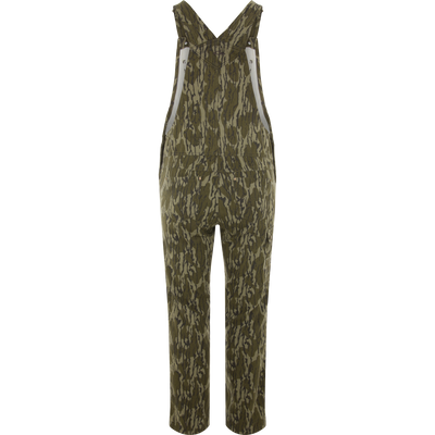 Throwback80 Field Bib in camouflage print, featuring reinforced hardware, multiple pockets, and durable cotton twill, ideal for rugged outdoor tasks and hunting.