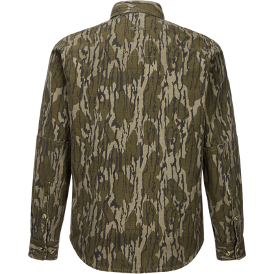 Throwback 80 Button Down Shirt in olive-gray camouflage, showcasing durable cotton twill, double-layered forearms, and triple-stitched seams, ideal for rugged outdoor activities.